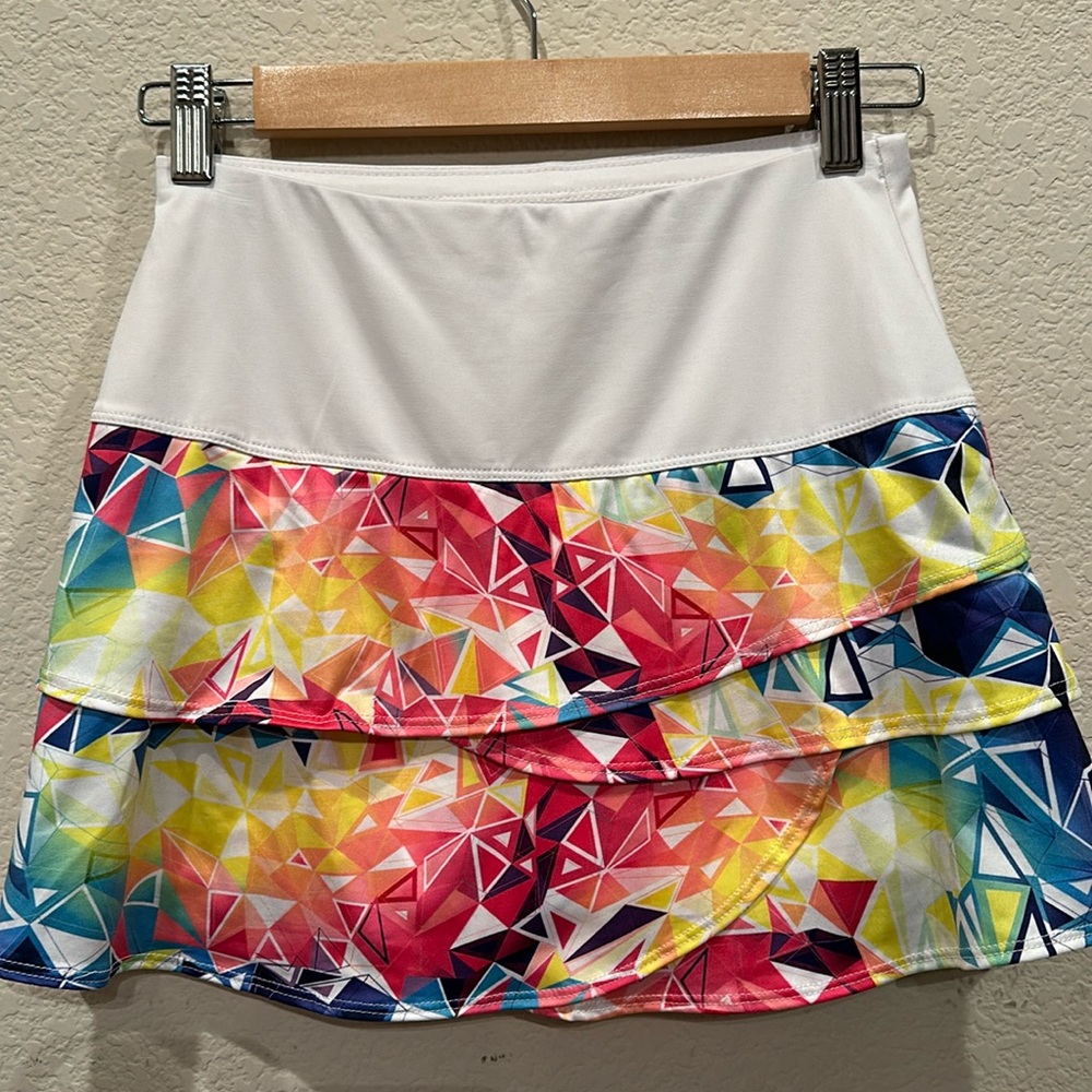 Tennis/pickleball skirt by Lucky in Love. XS/ built in shorts